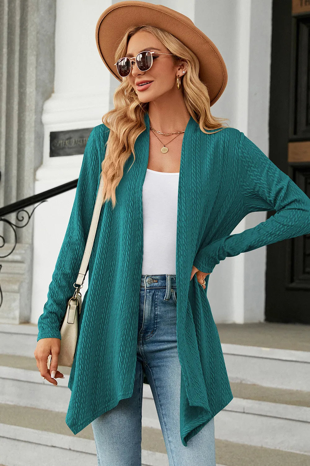 Women's Open Front Long Sleeve Cardigan in turquoise layered over a white tank and blue jeans, lightweight long cardigan for fall outfits, available in nine colors at Chic Mystik Boutique.