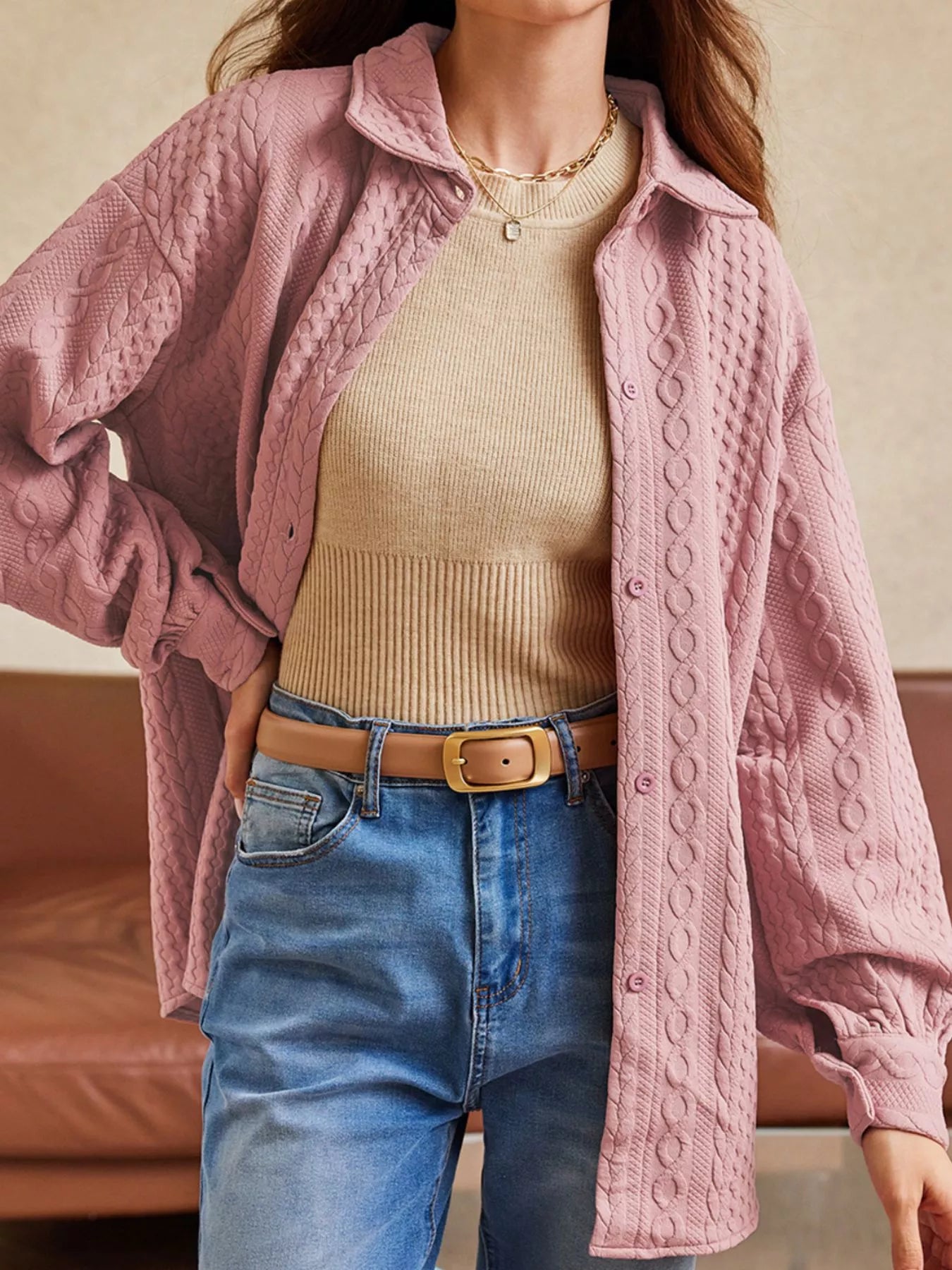 Layer your favorite fall looks with our Cable Texture Puff Sleeve Shacket. Available in Gray, White, and Pink, this cozy button-up shacket combines timeless texture with everyday comfort for effortless seasonal style.