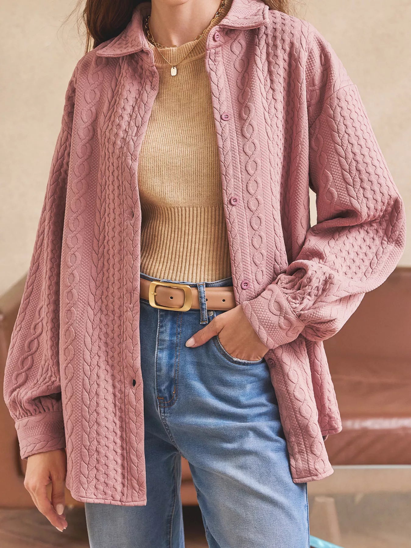 Layer your favorite fall looks with our Cable Texture Puff Sleeve Shacket. Available in Gray, White, and Pink, this cozy button-up shacket combines timeless texture with everyday comfort for effortless seasonal style.