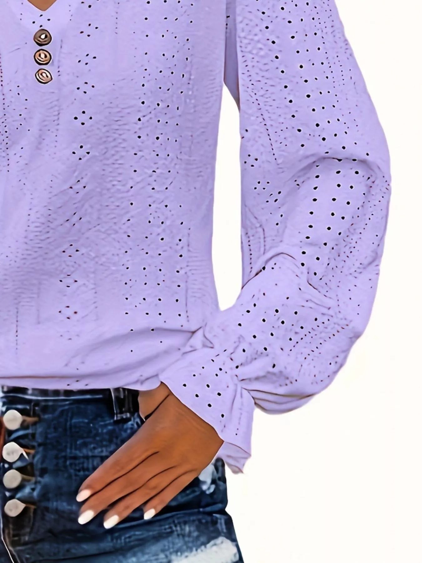 Purple long-sleeve top with button details on a white background
