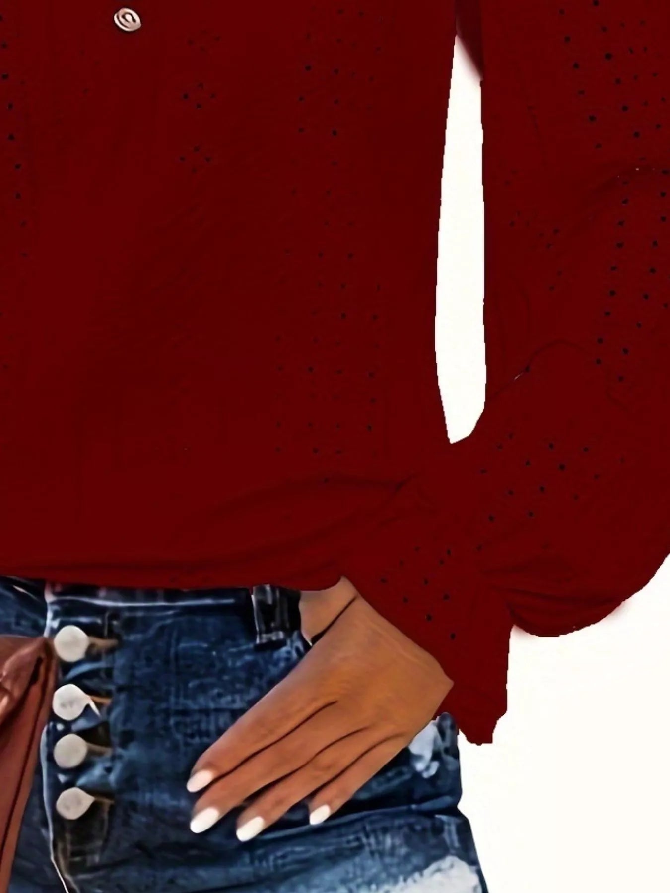 Red long-sleeve top worn by a person with a white background