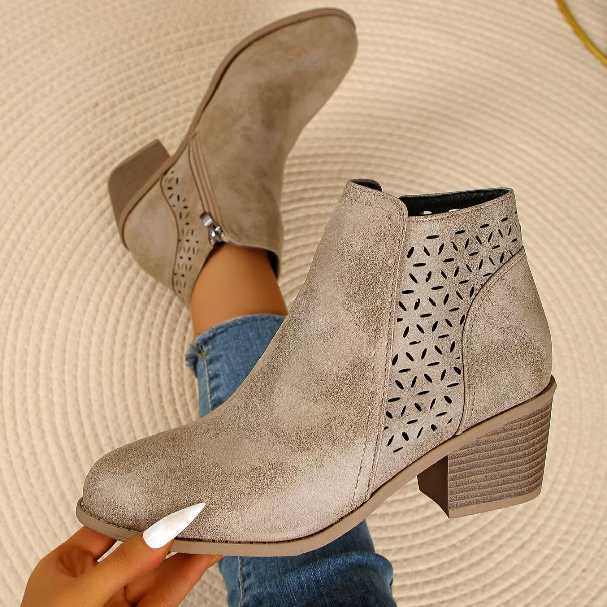 Women’s point toe block heel ankle boots with perforated side detail in khaki.