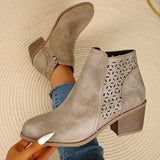 Women’s point toe block heel ankle boots with perforated side detail in khaki.
