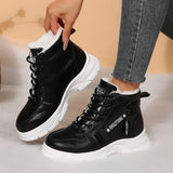 Women’s fleece-lined lace-up combat boots with chunky rubber sole and side detail, available in khaki, black and white.