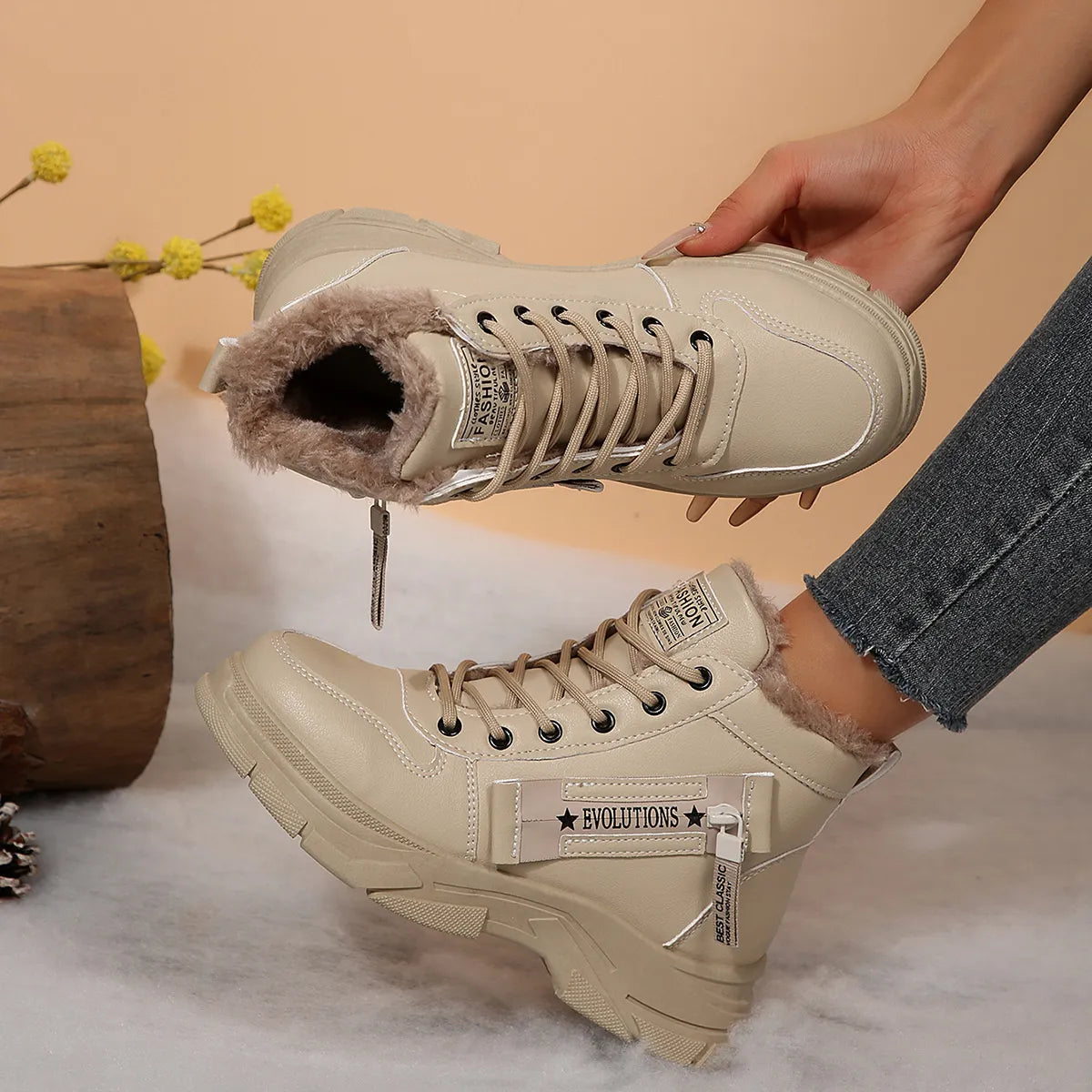 Women’s fleece-lined lace-up combat boots with chunky rubber sole and side detail, available in khaki, black and white.