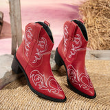 Red Western ankle boots featuring white embroidered details, a pointed toe, and a mid-height block heel.