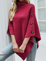 Women's red rose turtleneck poncho pullover with decorative button details and relaxed draped fit.
