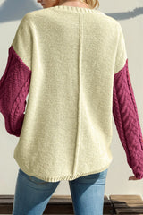 Double Take women’s red and violet color block cable-knit drop shoulder sweater with front pocket and long sleeves.