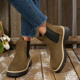 Army green suede round toe Chelsea ankle boots with black elastic side panels, mid-block heels and lug soles.