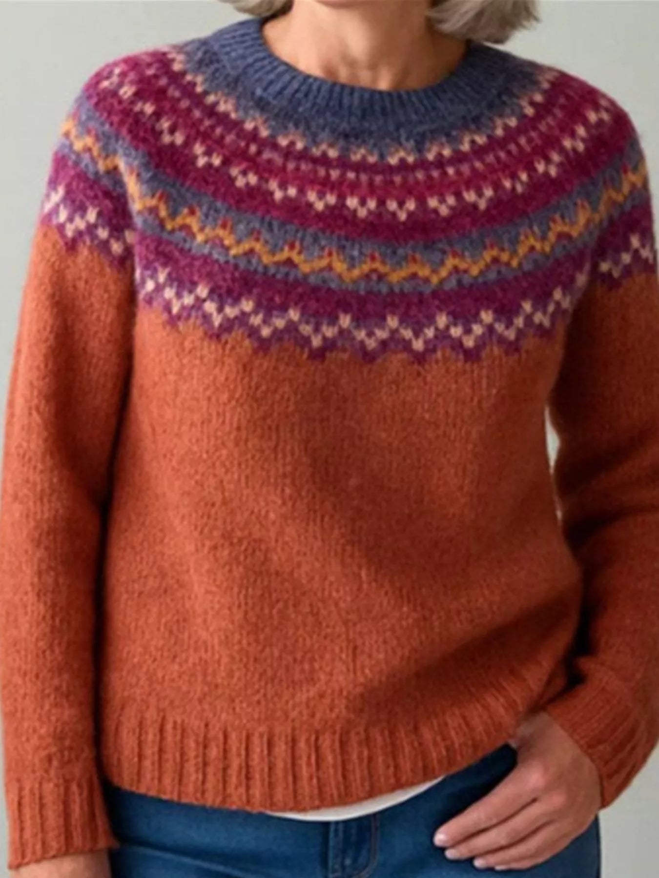 Women’s vintage patterned round neck sweater in rust with multicolor yoke design, available in sizes Small through 5XL.