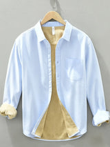 Men’s sky blue plus size button-up long sleeve cotton shirt with chest pocket and contrasting light interior, available in sizes Medium through 3XL.