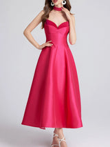 Rose red evening gown on a white background