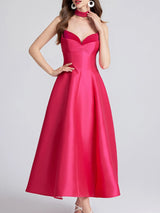 Rose red strapless dress on a white background