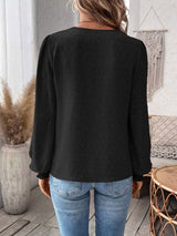Women’s Swiss Dot Lace Detail Long Sleeve Blouse in black with V-neck lace detailing and long sleeves, available in sizes S–2XL.