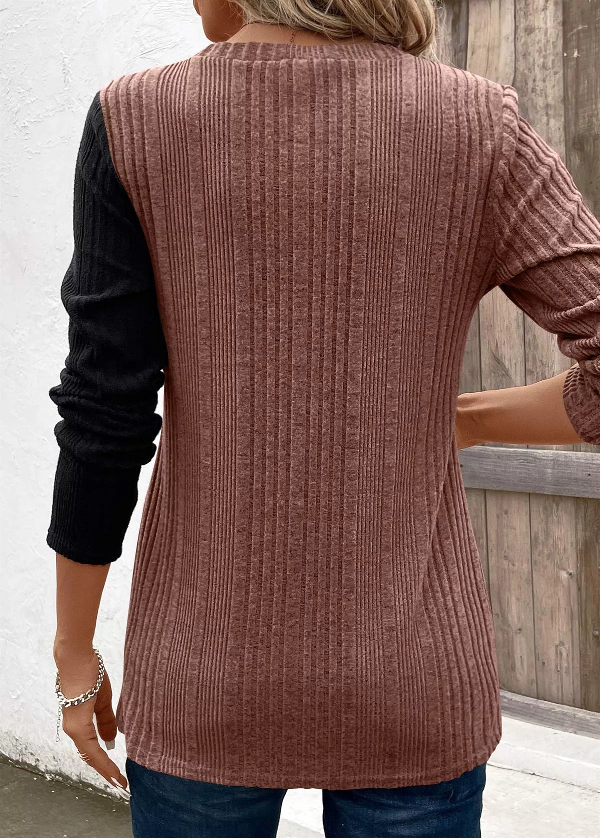 Women’s taupe and black color block ribbed knit long sleeve top with decorative side buttons and slit detail, available in sizes Small–2XL.