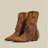 Brown suede Western boots with pointed toes, layered fringe, studded straps and low heels.