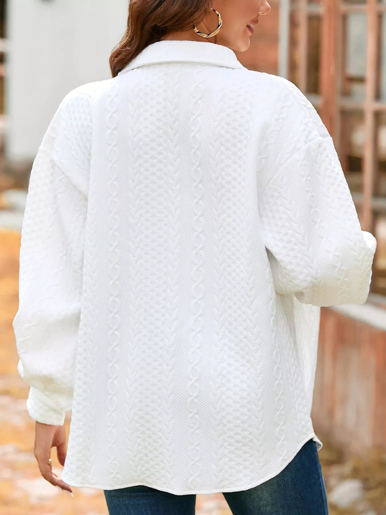 Layer your favorite fall looks with our Cable Texture Puff Sleeve Shacket. Available in Gray, White, and Pink, this cozy button-up shacket combines timeless texture with everyday comfort for effortless seasonal style.