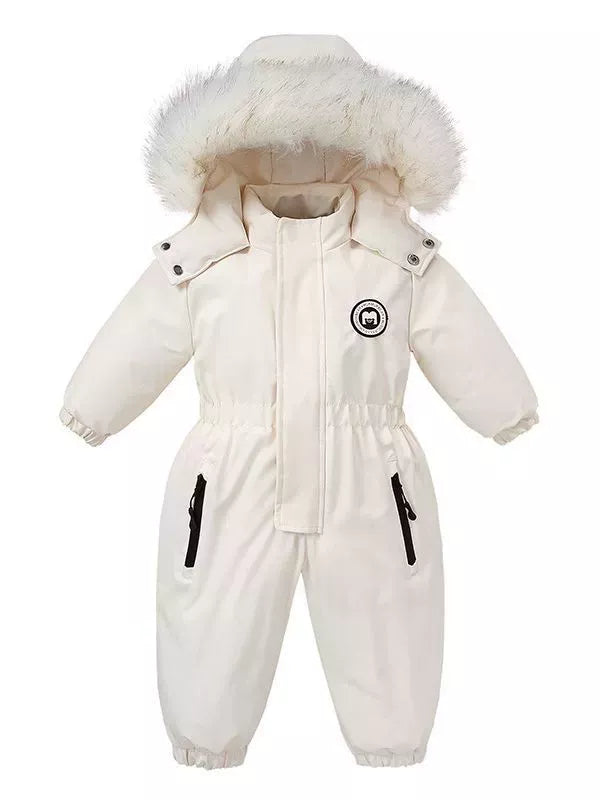 Children's white one-piece winter snowsuit featuring a fluffy white faux fur-trimmed hood, rust-colored accents, elasticized waist, and front pockets.