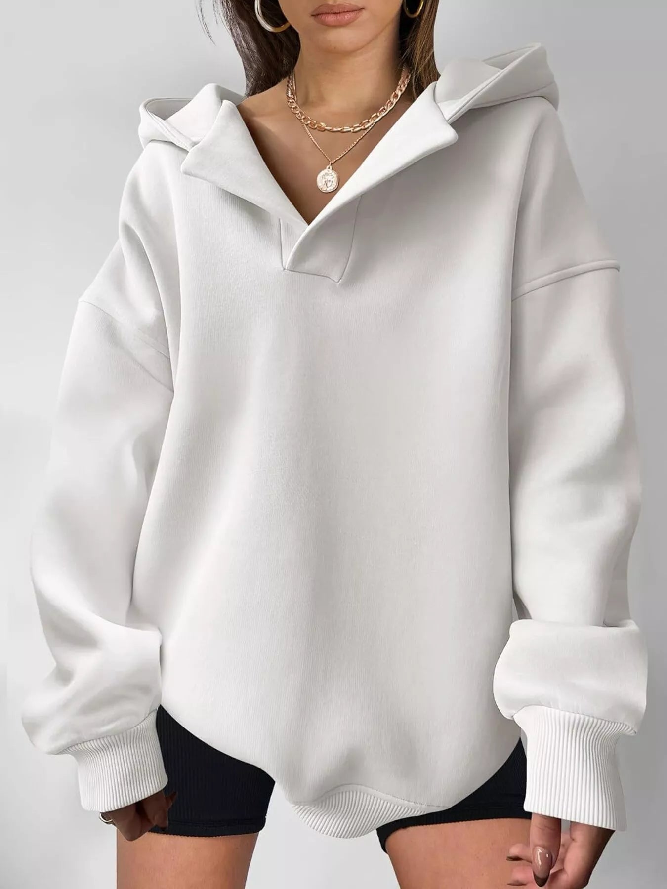 Women's oversized dropped shoulder hoodie sweatshirt in white with long sleeves and relaxed fit, perfect for casual fall outfits, available in 11 colors and sizes Small–2XL.