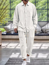 Men’s white button down long sleeve shirt and matching pants two-piece set with drawstring waist, available in sizes Small–2XL.