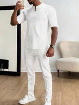 Men's white short-sleeve top and matching pants two-piece casual set with white sneakers, available in sizes Small–3XL.