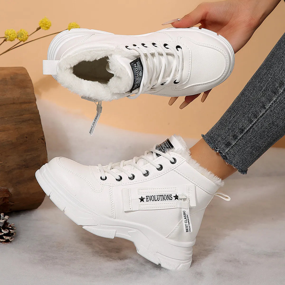 Women’s fleece-lined lace-up combat boots with chunky rubber sole and side detail, available in khaki, black and white.