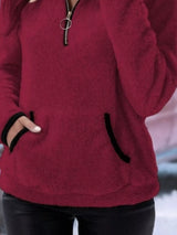 Cozy up in this full-size fleece quarter zip sweatshirt with pockets. Slightly stretchy and available in 11 colors and sizes Small–3XL for easy everyday style.