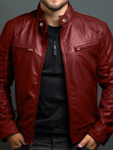 Men’s wine red PU leather motorcycle jacket with zipper front, stand collar and zippered chest pockets, available in sizes Small–5XL.