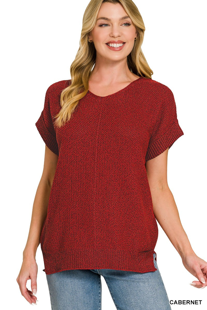 Woman wearing a red sweater with 'Cabernet' text on a white background